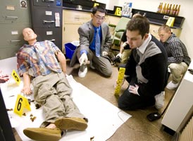 Dr. Hsieh teaches his students in the mock crime scene